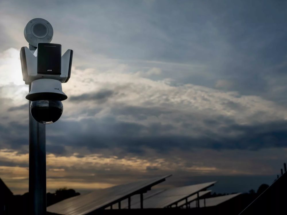 Axis PTZ camera on a pole overlooking a solar farm