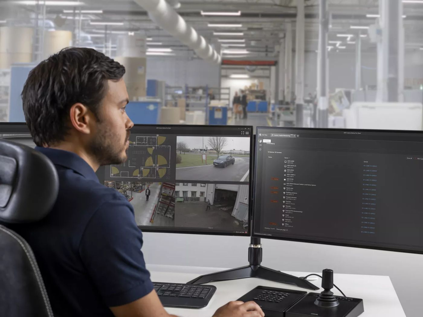 Operator monitoring live camera views and system health in AXIS Camera Station Pro